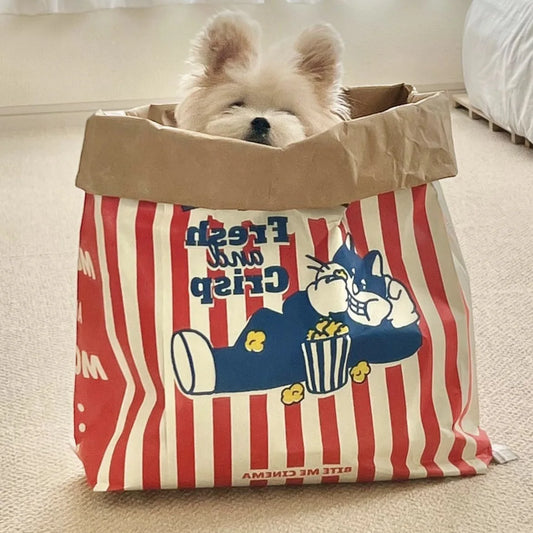 Popcorn Bag Pet Interactive Toy Front Image with Puppy Hiding in the Bag