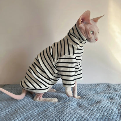 side image of cat wearing black and white strips shirt