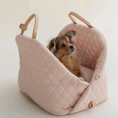 front image of pink color Comfort Minimalism Pet Carrier with dog sitting in it