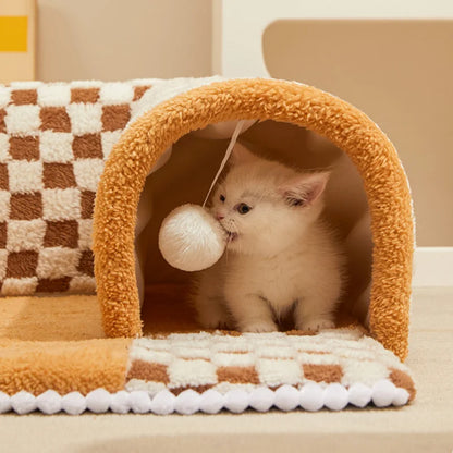 Detachable Cat Tunnel Carpet with Teaser Balls Close Up Image Showing Cat Biting the Teaser Ball