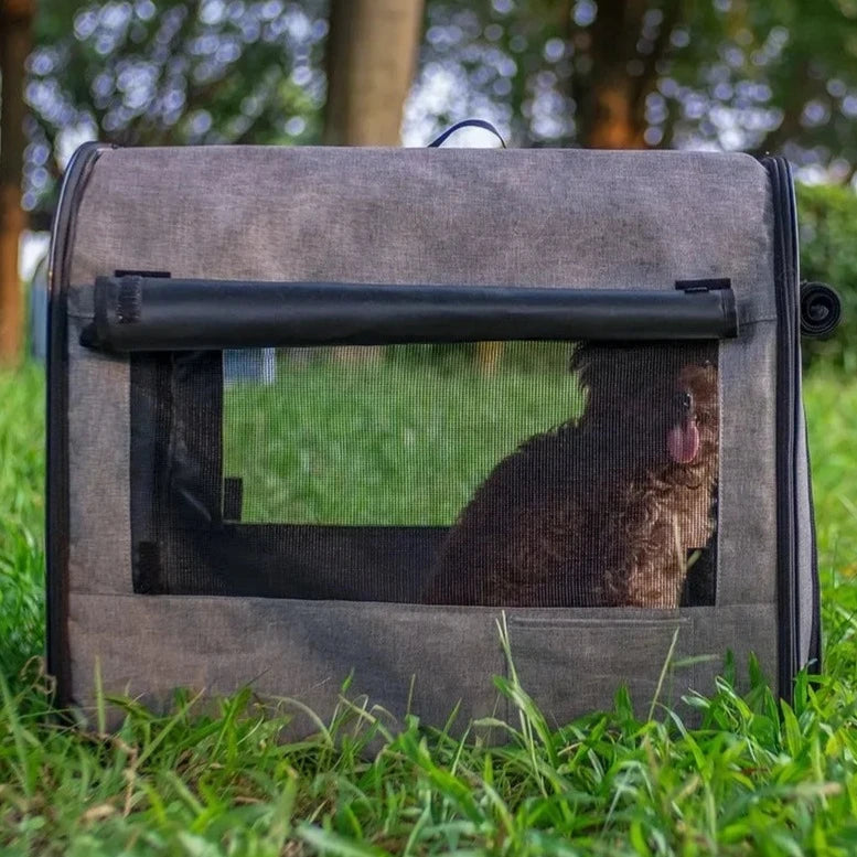 side image of grey color Waterproof Travel Pet Carrier With Rolling Door with dog inside