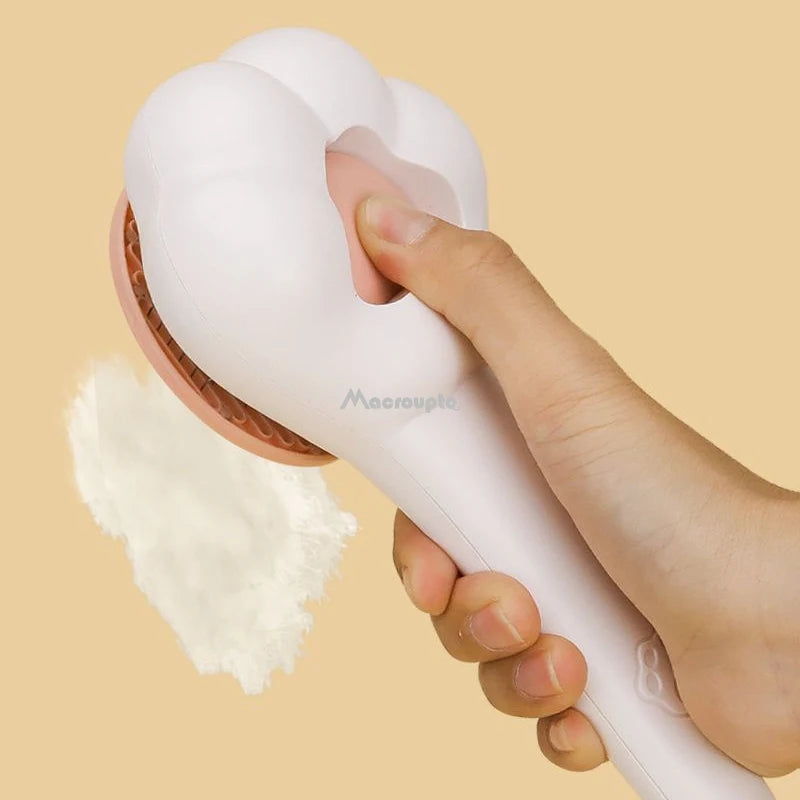 close up image showing the Paw-Style Pet Grooming Brush dispose hairs