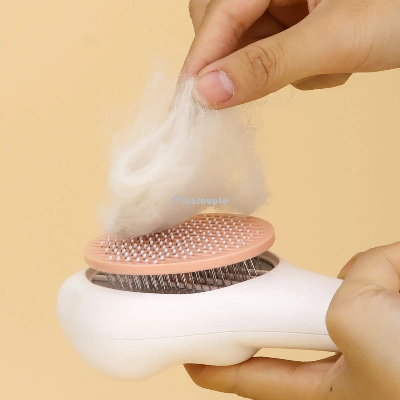 close up image showing the hairs attached to Paw-Style Pet Grooming Brush