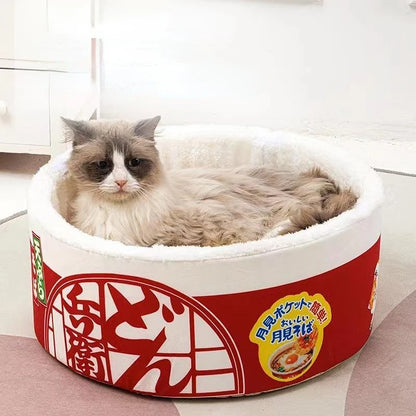 front image of red color Ramen Noodle Cup Cat Bed with cat inside